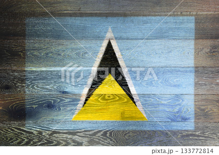 St. Lucia flag on rustic old wood surface background 133772814