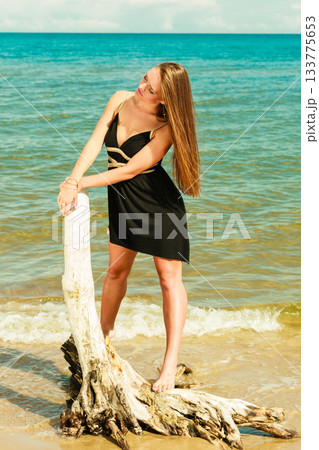 Beautiful sexy girl on seashore Beautiful sexy girl on seashore 133775653