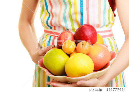 housewife or seller offering healthy fruits isolated 133777454