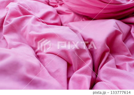 Detailed closeup of pink quilt bedding Detailed closeup of pink quilt bedding 133777614