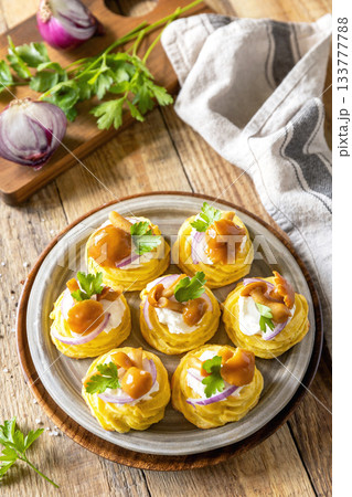 Potato tartlets filled with cottage cheese and marinated mushrooms. Potato tartlets filled with cottage cheese and marinated mushrooms. 133777788