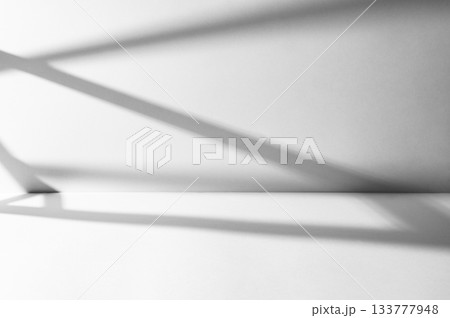 Geometric shadows cast on white background. Geometric shadows cast on white background. 133777948