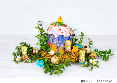 Easter cake and painted eggs, white flowers, festive composition in rustic style,ukrainian orthodox tradition, vintage wooden background, selective focus Easter cake and painted eggs, white flowers, festive composition in rustic style,ukrainian orthodox tradition, vintage wooden background, selective focus 133778521