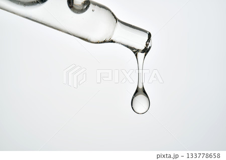 Cosmetic pipette dropping serum or facial oil fluid 133778658