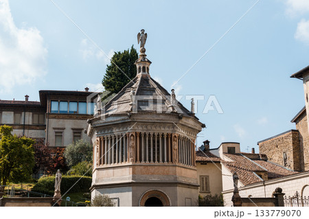 The Baptistery in Bergamo, Italy, showcasing its historical architecture. The Baptistery in Bergamo, Italy, showcasing its historical architecture. 133779070
