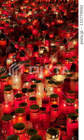 flaming red candles , a place of reverence , abstract background flaming red candles , a place of reverence , abstract background 133779092