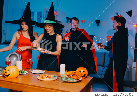 Joyful office Halloween party with coworkers in costumes, celebrating with drinks and laughter, fostering teamwork and festive spirit Joyful office Halloween party with coworkers in costumes, celebrating with drinks and laughter, fostering teamwork and festive spirit 133779309