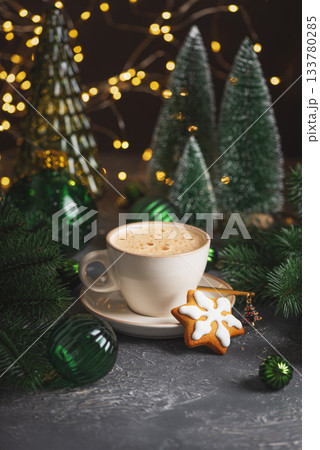 Mug of Coffee Latte and Christmas Gingerbread cookie into Pine Decor Mug of Coffee Latte and Christmas Gingerbread cookie into Pine Decor 133780285