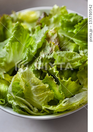 Green salad in a white bowl 133780542