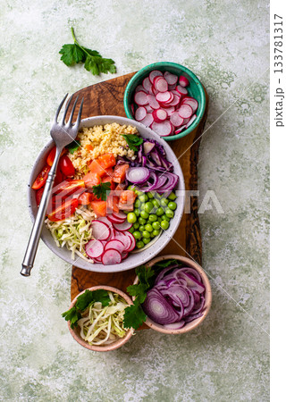Balanced healthy bowl with vegetables and salmon Balanced healthy bowl with vegetables and salmon 133781317