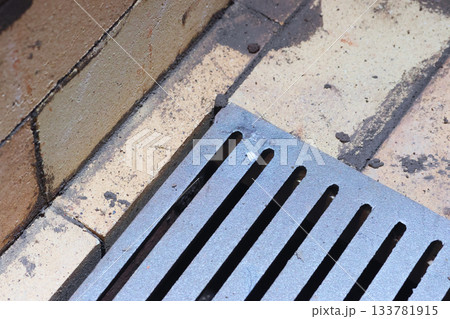 Fireclay masonry of the firebox and grate. Construction of a heating stove. Close-up. Fireclay masonry of the firebox and grate. Construction of a heating stove. Close-up. 133781915