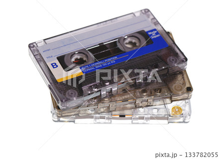 Stack of retro audio cassettes isolated on white background Stack of retro audio cassettes isolated on white background 133782055