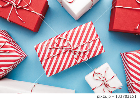 Color gift boxes on color background, flat lay 133782151