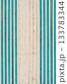 Vertical background of a plank wall on a seaside pier, space for advertising a pier vacation or seafood 133783344