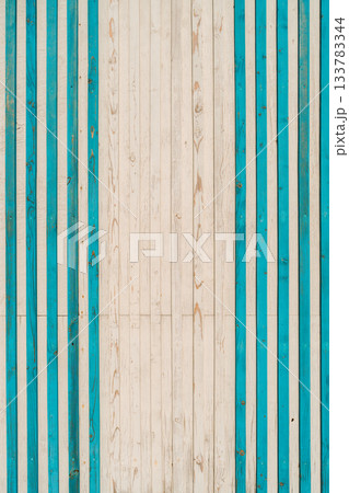 Vertical background of a plank wall on a seaside pier, space for advertising a pier vacation or seafood Vertical background of a plank wall on a seaside pier, space for advertising a pier vacation or seafood 133783344