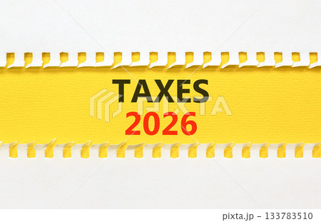 Taxes 2026 new year symbol. Concept words Taxes 2026 on beautiful yellow paper. Beautiful white paper background. Business and taxes 2026 new year concept. Copy space. Taxes 2026 new year symbol. Concept words Taxes 2026 on beautiful yellow paper. Beautiful white paper background. Business and taxes 2026 new year concept. Copy space. 133783510