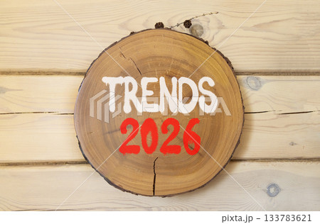 Trends 2026 new year symbol. Concept words Trends 2026 on beautiful wooden circle. Beautiful wooden wall background. Business and Trends 2026 new year concept. Copy space. Trends 2026 new year symbol. Concept words Trends 2026 on beautiful wooden circle. Beautiful wooden wall background. Business and Trends 2026 new year concept. Copy space. 133783621
