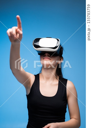 Architect Using VR Interface for 3D Project Interaction and Virtual Design Navigation in Futuristic Space 133783759