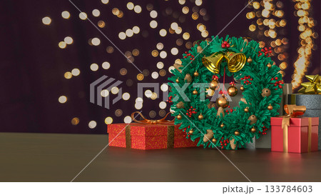 Christmas Wreath and Gift Boxes with Holiday Lights 3d render. 133784603