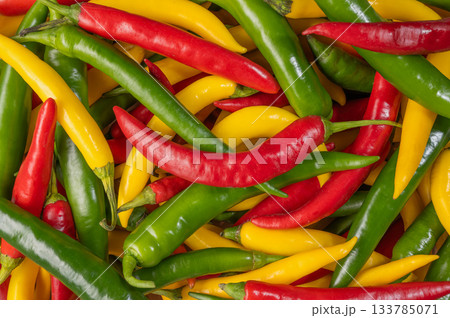 A crop of chili peppers of different colors, viewed from above 133785071