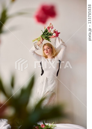 white woman wearing tulip crown, joyful home celebration white woman wearing tulip crown, joyful home celebration 133785838