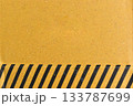 striped black and yellow cardboard box texture background 133787699