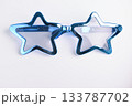blue star shape of glasses on white background 133787702