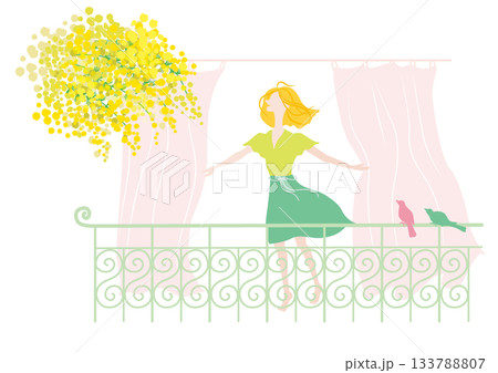 バルコニーで春風を浴びる女性 133788807