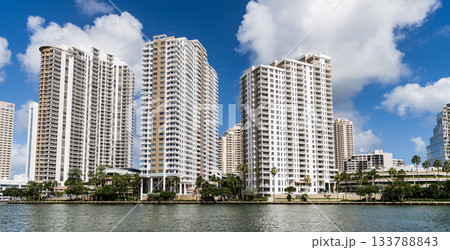 Aerial view of Brickell skyline in downtown Miami. Modern skyscrapers rise above Biscayne Bay. Miami Urban landscape with iconic buildings. Miami cityscape. Aerial view of Brickell skyline in downtown Miami. Modern skyscrapers rise above Biscayne Bay. Miami Urban landscape with iconic buildings. Miami cityscape. 133788843
