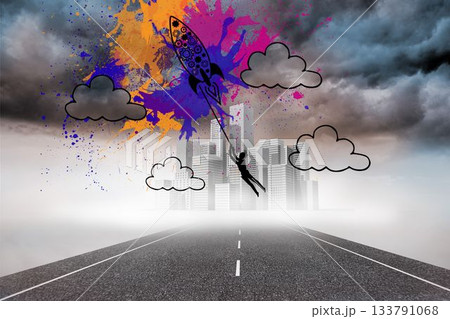 Rocket on splashes over cityscape on street 133791068