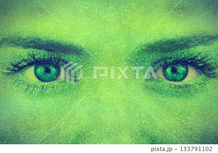 Human eyes and brow region are being shown in stylized close-up illustration, with green grain 133791102