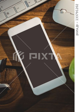 Flat design is featuring smartphone on wooden desk with keyboard, mouse, green apple, lens cap 133791202