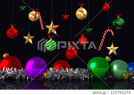 Flat design holiday baubles, candy canes and stars are hanging over tinsel against black backdrop Flat design holiday baubles, candy canes and stars are hanging over tinsel against black backdrop 133791274