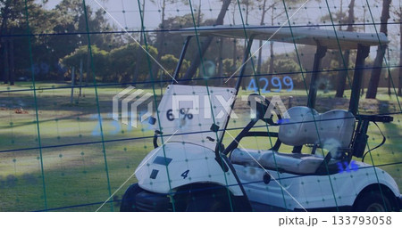 Showing golf cart sitting on fairway with green safety net and digital grid with data points Showing golf cart sitting on fairway with green safety net and digital grid with data points 133793058