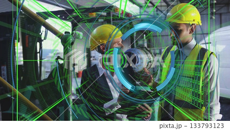 Engineers wearing helmets and vests inspecting turbine component in hangar, with AR overlays Engineers wearing helmets and vests inspecting turbine component in hangar, with AR overlays 133793123