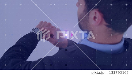 Checking square smartwatch, business professional demonstrating augmented reality at demo space Checking square smartwatch, business professional demonstrating augmented reality at demo space 133793165