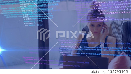 Focusing coder wearing striped shirt viewing laptop at glass partition, code overlay, copy space 133793166