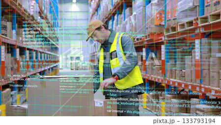 Standing warehouse worker in yellow vest surveying storage aisle, with green digital grid overlay Standing warehouse worker in yellow vest surveying storage aisle, with green digital grid overlay 133793194