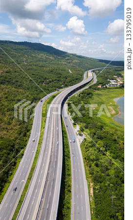 Drone shot The M6 motorway Nakhon Ratchasima Province - Bang Pa-in Lam Ta Khong River and Mountain. Motorway Korat Thailand 133795019