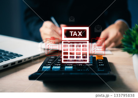 Business hand calculating taxes on digital calculator with red tax icons, representing tax return process, income analysis, accounting system and online financial software. 133795838