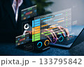 Project management dashboard. Businessman using digital laptop with timeline, charts, and task tracking for productivity, planning, and data analysis in smart business workflow. 133795842
