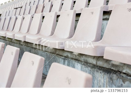 Empty seats in row at stadium Empty seats in row at stadium 133796153