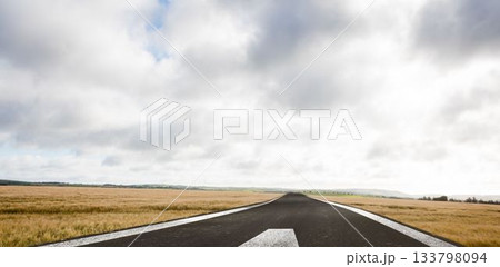 Flat design illustration is showing asphalt runway extending toward distant hills with grass fields Flat design illustration is showing asphalt runway extending toward distant hills with grass fields 133798094