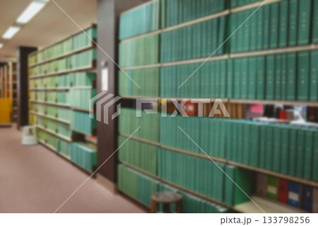 Green books on shelf in library Green books on shelf in library 133798256