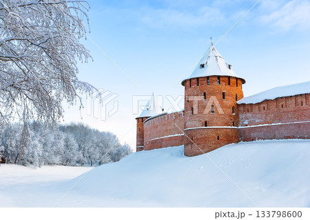 Novgorod Kremlin in winter sunny day in Veliky Novgorod, Russia. Towers of Kremlin fortress in frosty cold winter in Veliky Novgorod. 133798600