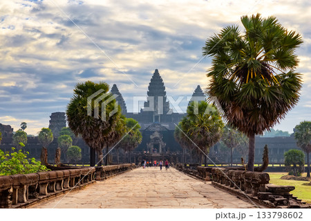 Amazing view of famous Angkor wat temple in Siem Reap, Cambodia, at sunrise. Angkor Wat in Cambodia is the largest religious monument in the world. 133798602