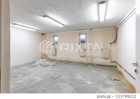 Empty Basement Room with Concrete Floor Interior 133799222