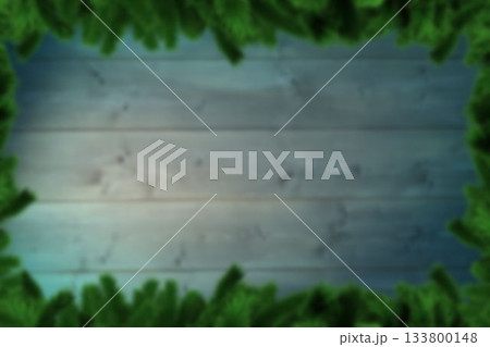 Blurred fir tree branches on wood 133800148