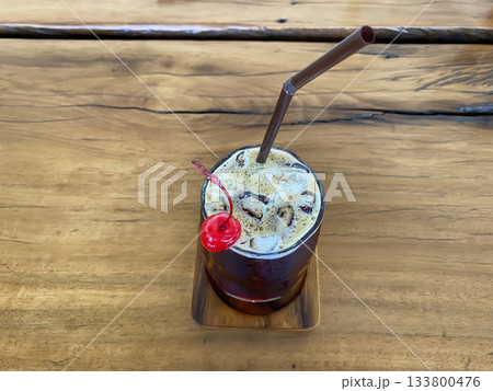 Iced coffee with cherry 133800476