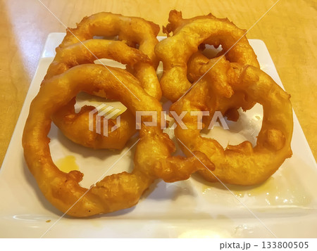 Crispy fried onion rings Crispy fried onion rings 133800505